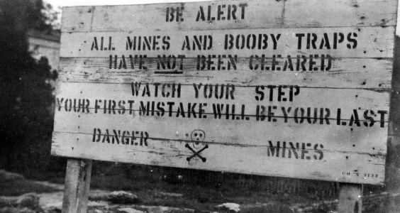Sign which greeted the 11th Armored Division as it landed.