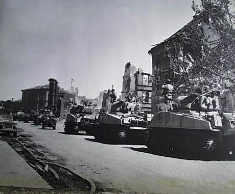 11th Armored column passing through Bayreuth, April 19 1945.