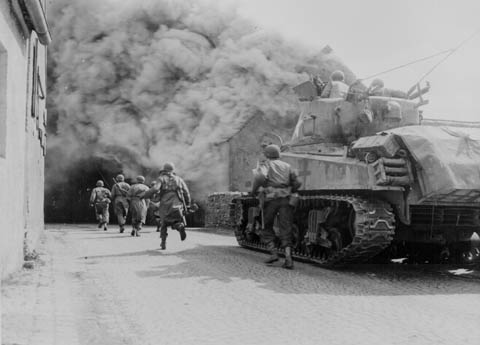 Soldiers of 55th Armored Infantry Battalion & 22 Tank Battalion at Wernberg Germany, April 22 1945. 