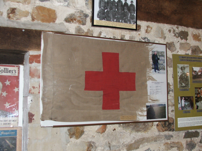 Red Cross flag used on D-Day. The medic later was murdered in the Malmedy-massacre.